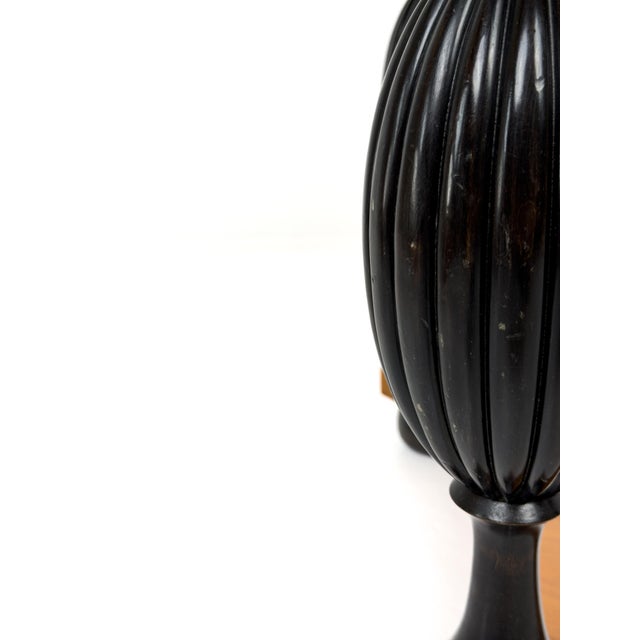 This exceptional Swedish Grace center table, attributed to Birger Ekman for Mjölby Intarsia, Sweden, circa 1920s,...