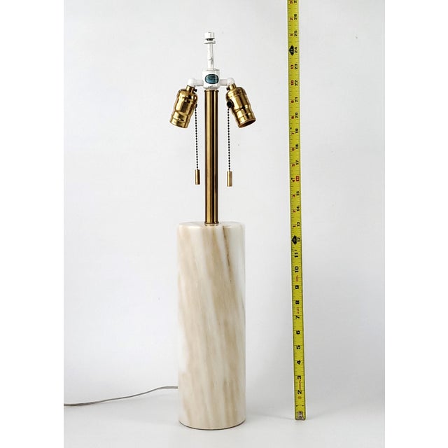 Offering an iconic Mid 20th Century Modern marble table lamp by Nessen Lighting, designed by Walter Von Nessen, circa...