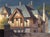 Corner of the Manor by Diego Glazer | Oil on Board Painting of a manor house exterior For Sale