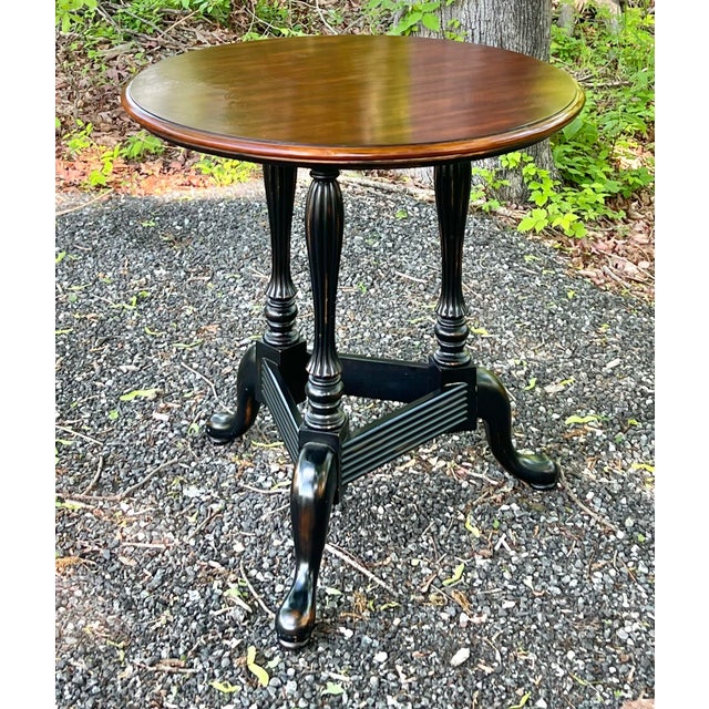 Striking solid cherry Queen Anne side table. Three column pedestal base with beautifully reeded posts with snake feet. The...
