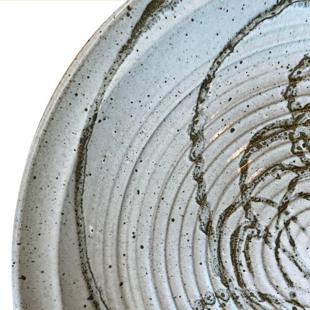 Monumental 1980's stoneware pottery charger. - 22" diameter. Hand thrown on a potters wheel - its ridged front is...
