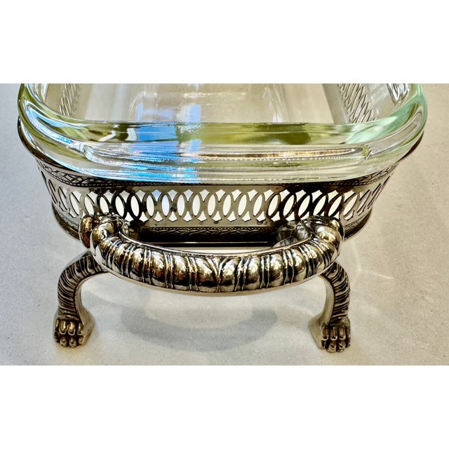 Elegant silver-plated footed casserole / dessert / bread server manufactured by International Silver Co. It feature...
