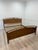 Ethan Allen Elements Collection King Size Bed frame, crafted from solid wood. The frame includes a headboard and footboard...