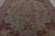 Made with hand-knotted wool, this 8x11 antique rug, circa 1920-1930, is a sophisticated addition to Rug & Kilim’s Persian...