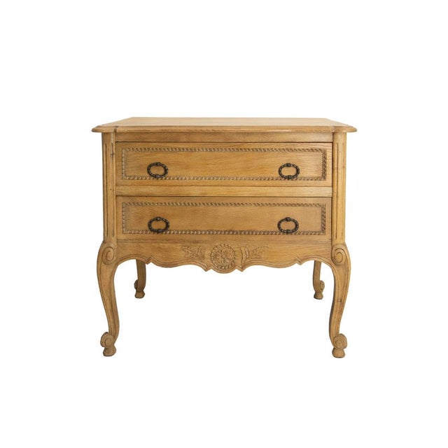 Commode in the Louis XV style, French chest of drawers, circa 1940. Oak and wrought ironvegetal and floral. Carved...