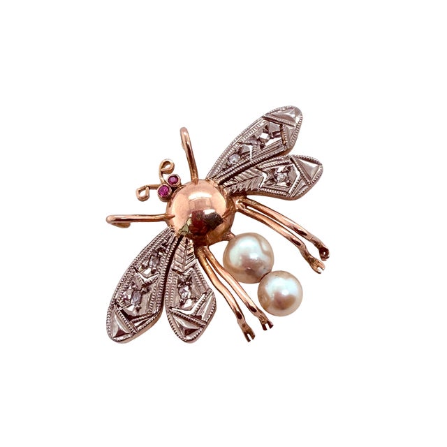 This is wonderful Victorian period brooch depicting a bee set with ruby eyes and rose cut diamond wings. The tail is...