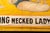Mustard Mid-20th Century “Long Necked Lady From Burma” Carnival Sideshow Banner For Sale - Image 8 of 10