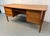 An exceptional example of Danish Modern design, this stunning teak desk was designed by renowned Danish designer Arne...