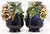 Haviland & co. Manufactory, limoges pair of polychrome painted ceramic vases with high relief floral applications....
