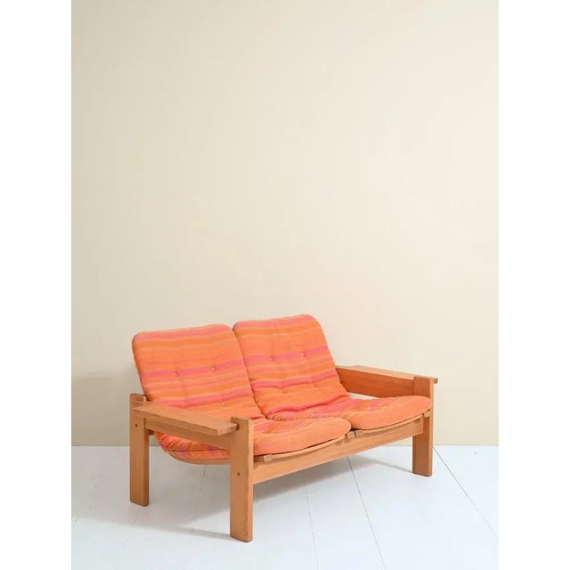 Two-seater sofa designed by Yngve Ekstom for Swedese in the 1970s The structure is in light pine wood and fabric seat. The...
