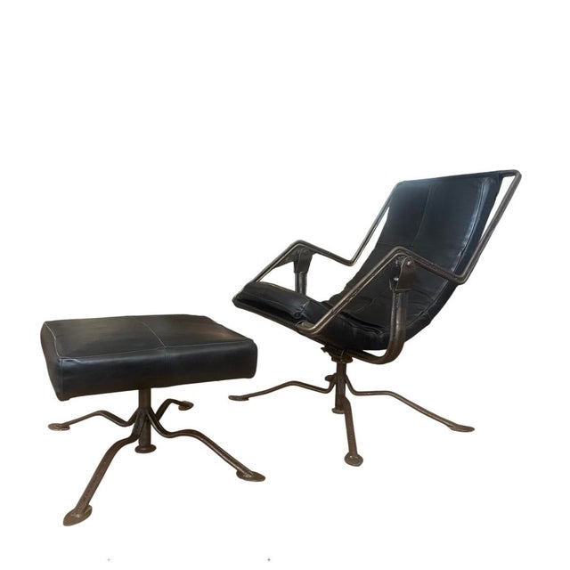 This striking Architectural Thick Motorcycle Leather Swivel Rocker Lounge Chair with matching ottoman was handcrafted by...