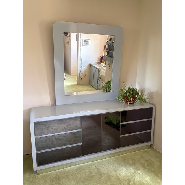 Exemplifying the sleek aesthetic of 1980s Postmodern design, this single-owner two-piece bedroom set features clean...