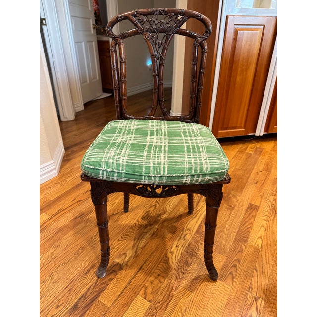 This is a beautiful faux bamboo antique or vintage side chair, likely dating from the late 19th to mid-20th century. The...