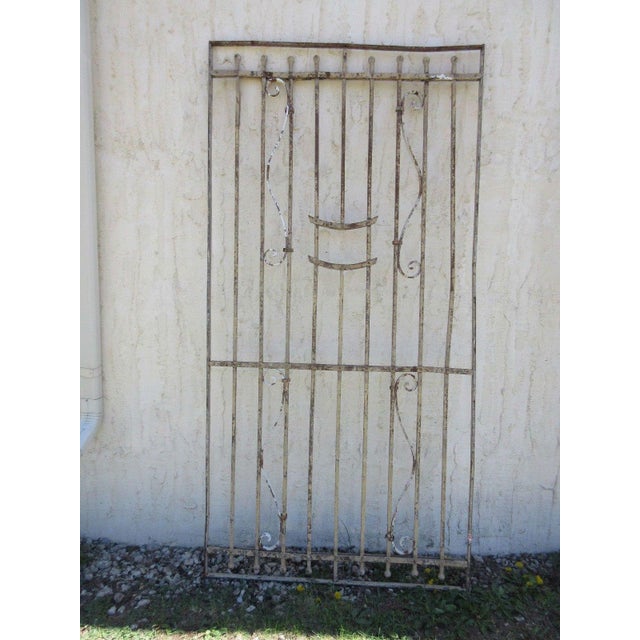 A piece of architectural salvage. Heavy and sturdy. Piece does show signs of age related wear including rust, flaking...