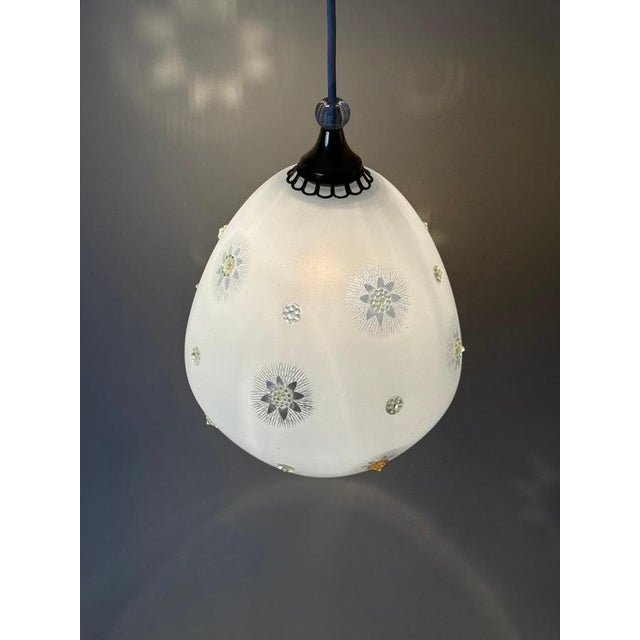 This exceptional pendant light is a refined example of design inspired by the style of Harald Notini, combining...