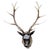 An impressive and highly decorative wall-mounted stag head sculpture, featuring a magnificent set of branching antlers and...