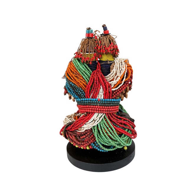 Superb vintage African &nbsp; Namji twin fertility dolls adorned with multiple layers of trade glass beads leather strips...