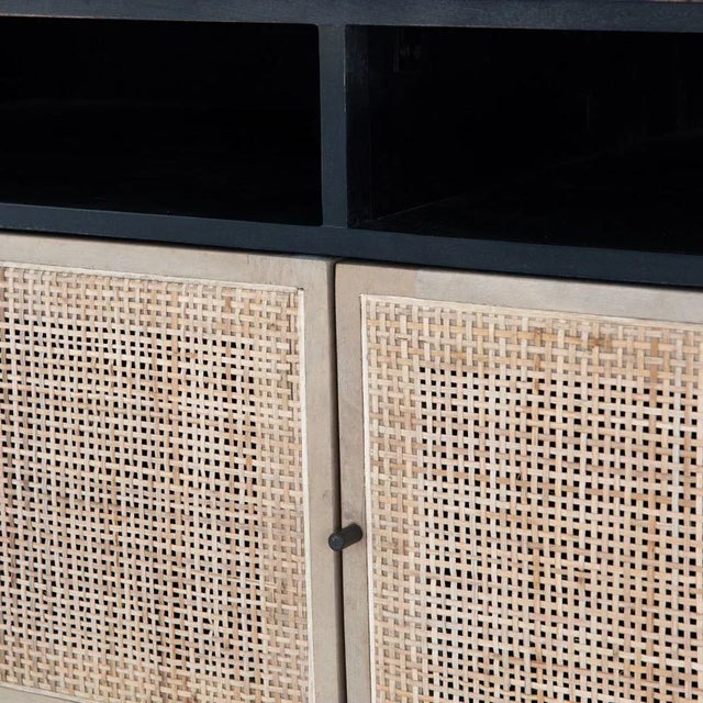 Mid-century-inspired style with an organic twist. Surrounded by black mango casing, light cane weaves for a fresh look...