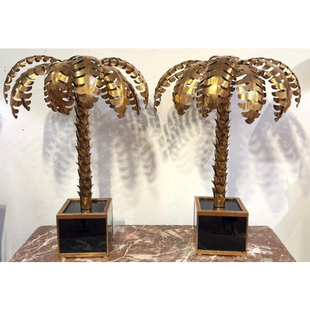 Pair of Maison Jansen Style Gilt Metal Palm Tree Table Lamps France, 20th Century Pair of gilt metal palm-form table lamps...