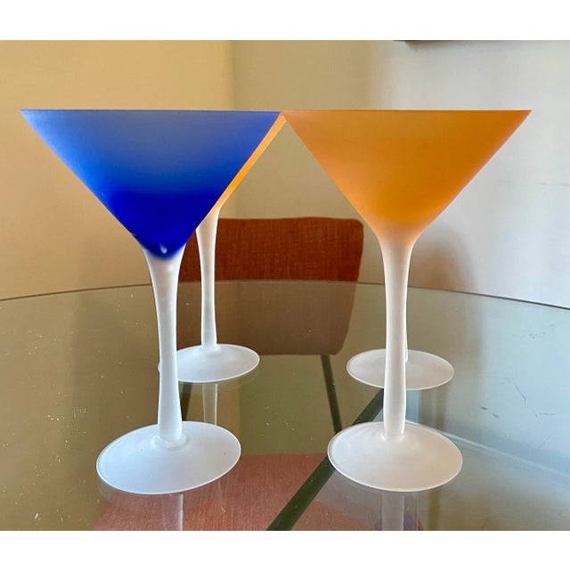 Set of four fun frosted martini glasses. Two of them are orange, two of them blue. No chips or scratches. A fantastic...