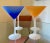 Set of four fun frosted martini glasses. Two of them are orange, two of them blue. No chips or scratches. A fantastic...