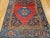 4’ 5” x 9’ 3” Late 19th century Persian Bidjar in a medallion geometric pattern. The rug has an open field design set on a...
