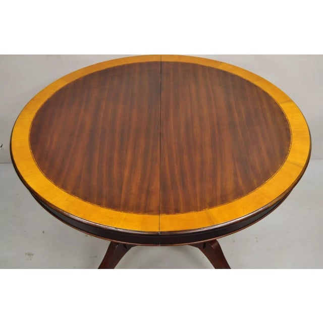Traditional Regency Style Mahogany Round Banded Oval Extension Dining Table W/ Leaf For Sale - Image 3 of 12