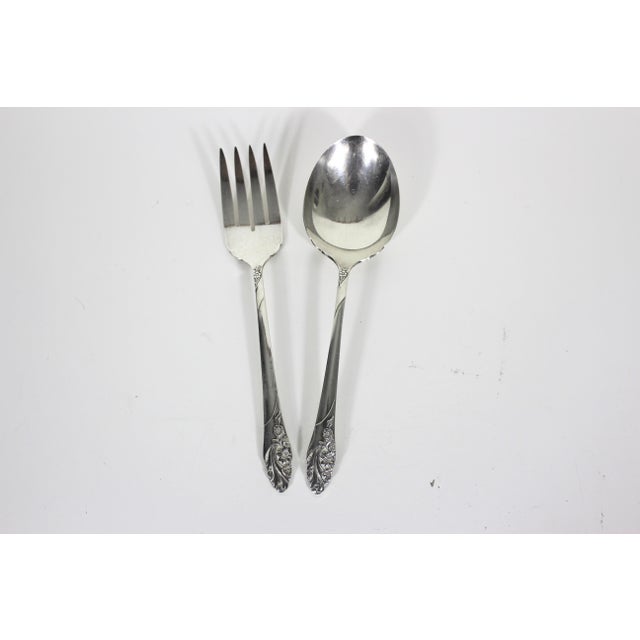 Fabulous set of silverplate mid century casserole serving spoon and cold meat fork. These are the Evening Star pattern...