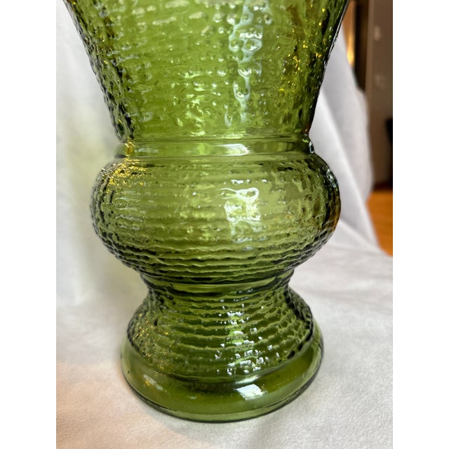 Great ripple texture on this large mouth (7.5” wide x 10” tall) mid-century modern green glass vase. Handles a large...