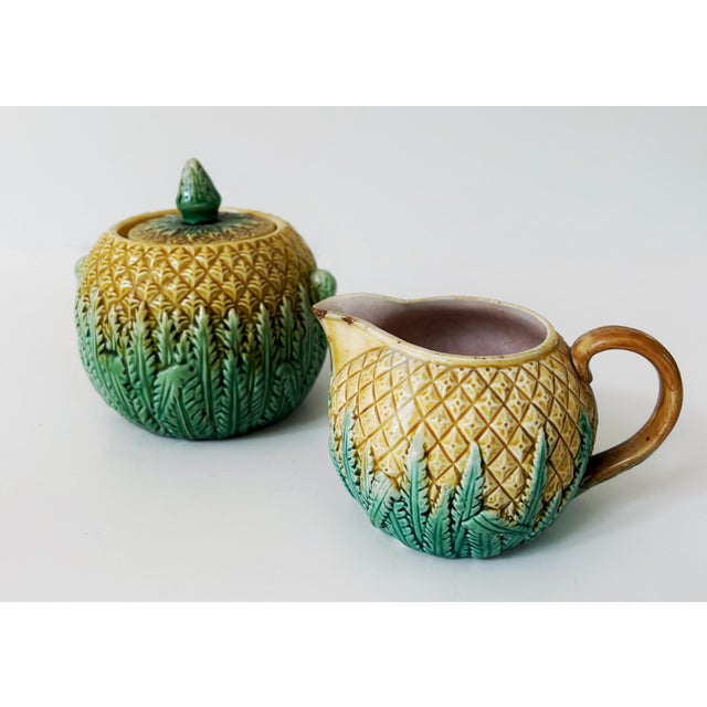 Antique 19th C Majolica Pineapple Pattern Creamer & Sugar C1880s. Measures: Creamer: 5 1/4" x 4 3 Sugar 5" at Handle x 5"...