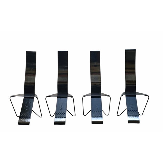 A set of four ‘Impronta’ chairs designed by Pietro Arosio in the 1980s. The chairs are characterised by a distinctive...