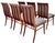 Exceptional set of six vintage Mid-Century Modern dining chairs featuring beautifully sculptural solid walnut frames with...