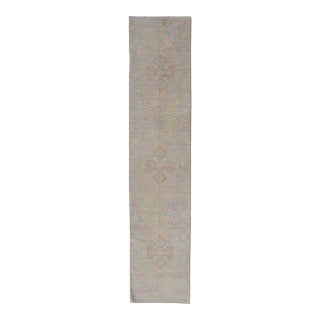 Hand-Knotted Oushak Runner With Medallion Design on a Tan Field With Red & Blue For Sale
