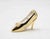 Shoe-Clock realized by Bucherer in 1970s. Metal and Glass.