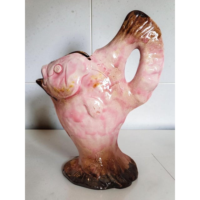 Tannay drinks service for Georges Sirdey, 1950s, comprising a fish-shaped pitcher and six large glasses. Pitcher height:...