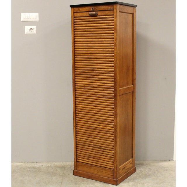Single-shutter filing cabinet Made of oak Early 1900s Dimensions: width 53 cm, depth 41 cm, height 172 cm Restored (see...