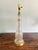 Elegant vintage Hollywood Regency table lamp featuring a tall, urn-form cut-glass body with intricate fluted and faceted...
