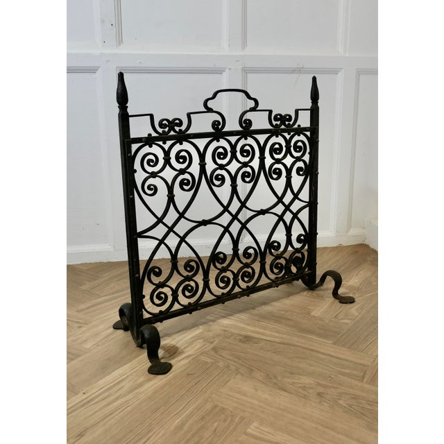 Very Heavy Old Gothic Wrought Iron Fire Screen This is a very attractive piece, the wrought iron work is superbly executed...