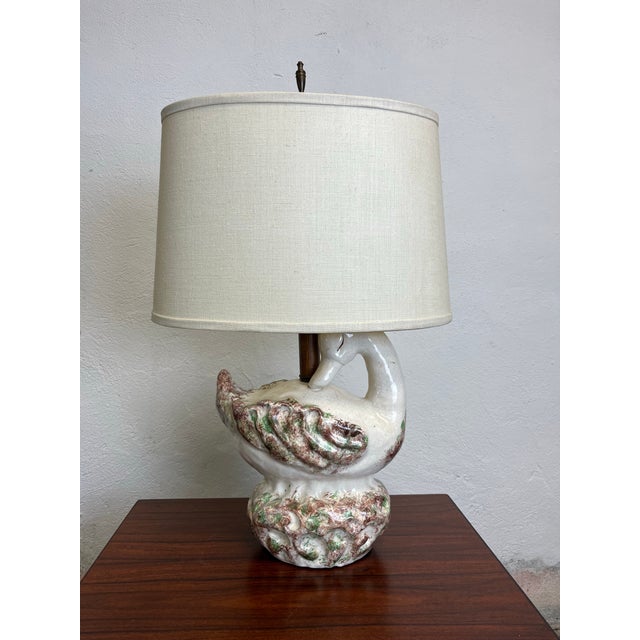 Outstanding crakle glaze ceramic Duck Lamp. Great expression. White with splashes of browns and green. Just great.