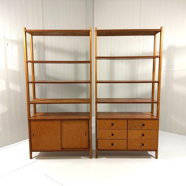 Set of 2 wall units. Beech wooden uprights with adjustable pressed wooden shelves. Each wall unit has a pressed wooden...