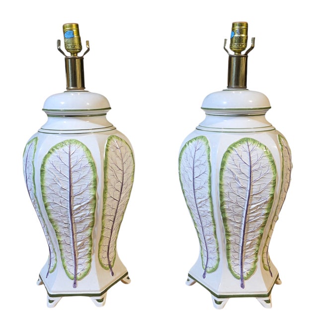 This Pair of Mid-20th Century Italian Majolica Ceramic Table Lamps, imported by Raymor, has a whimsical, decorative...