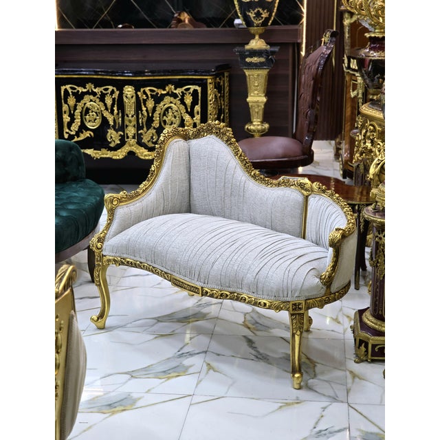 In love with the design. Beautiful sofa with gold details. Fully refinished in new gold and padding. We changed the...