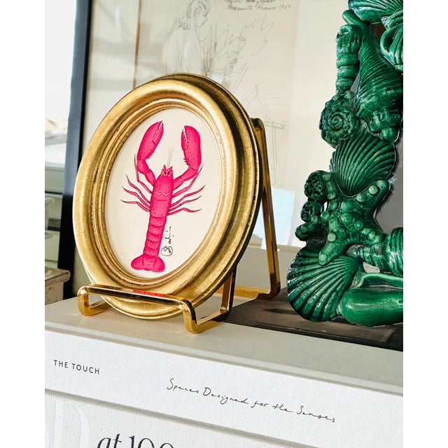 Introducing our exquisite hand-painted whimsical pink lobster painting, a true testament to the mastery of our team of...