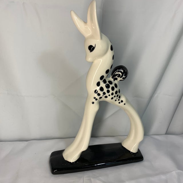 Add a striking touch of retro sophistication to your home decor with this gorgeous vintage Mid-Century Modern spotted deer...