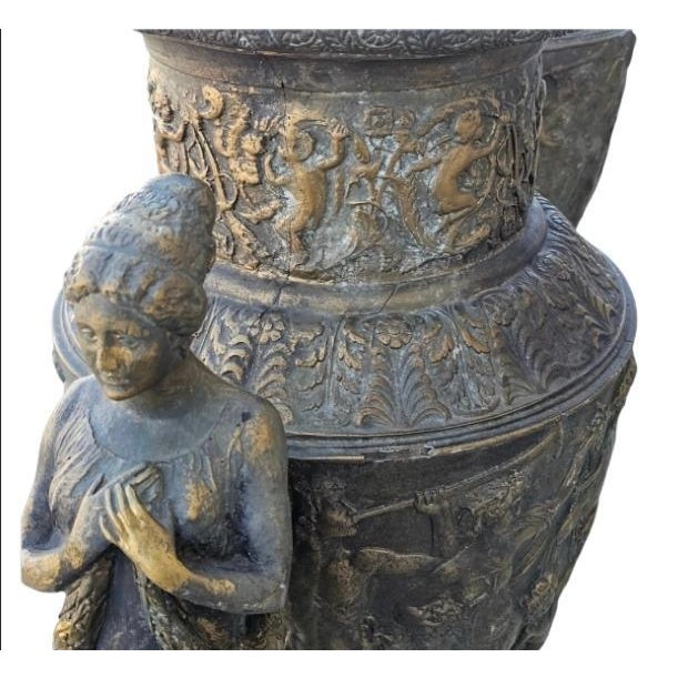 Vintage monumental French patinated neoclassical style two-handle vases. These vases are made of high-quality resin and...