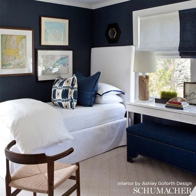 Kandira features a graphic pattern derived from woven ikats. A painterly checkerboard design with tonal variations and a...