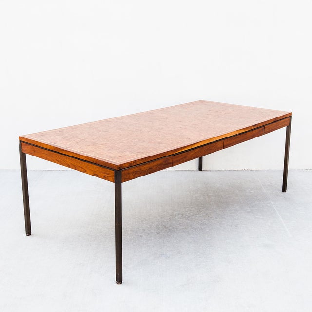 A monumental Parsons-style executive desk in burlwood and walnut with oak inlay, made by Hiebert of Torrance c. 1970s. The...