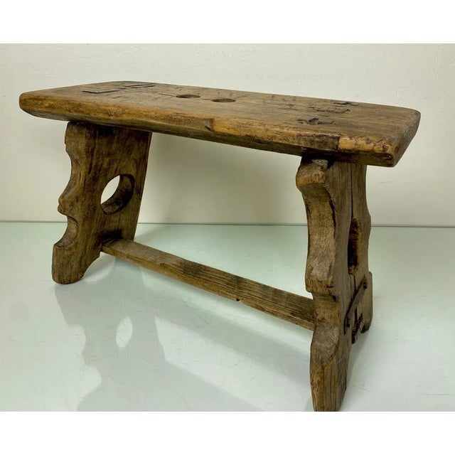 Beautiful old handmade stool, estimated period 1950, but can also be from earlier. Charming primitive design with a...