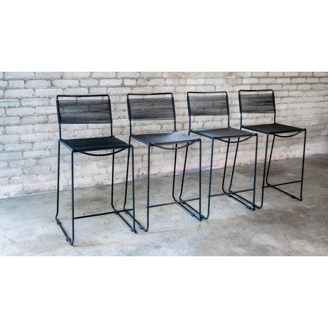 Vintage Post Modern 'Spaghetti' counter or bar stools attributed to Giandomenico Belotti, circa 1980s. Minimalist design...