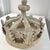 This sculptural French bed canopy crown, carved in openwork wood and painted in a soft chalky gray-white, dates to the...